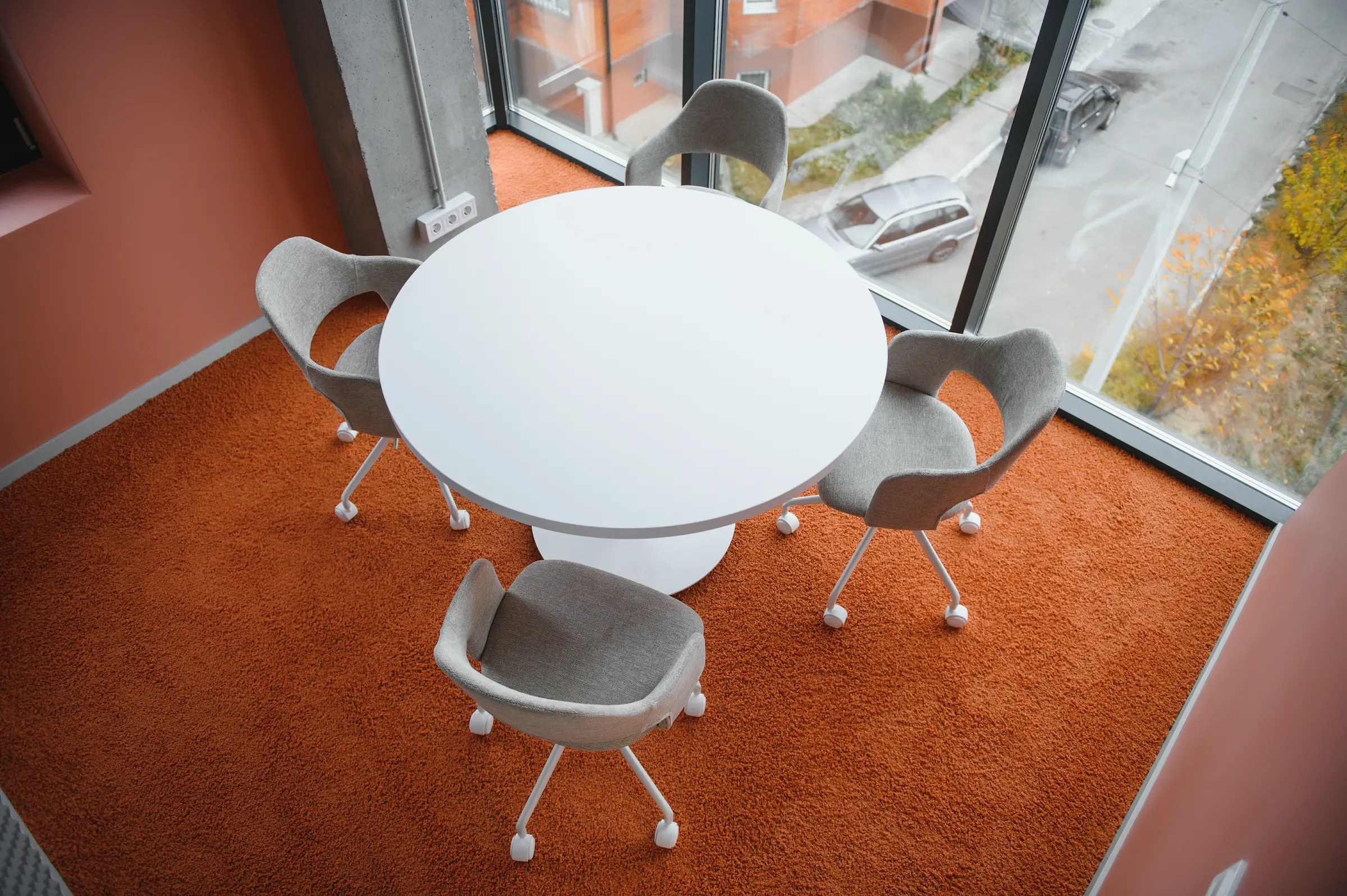 Conference room table and chairs with exterior vie